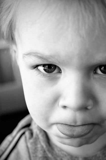 Newborn sticking tongue out